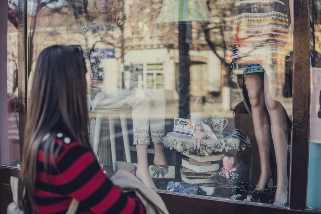 Photo of women window shopping.